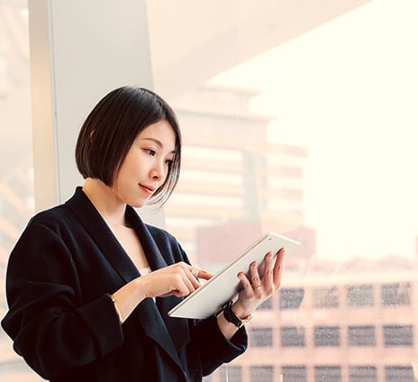 woman reading tablet